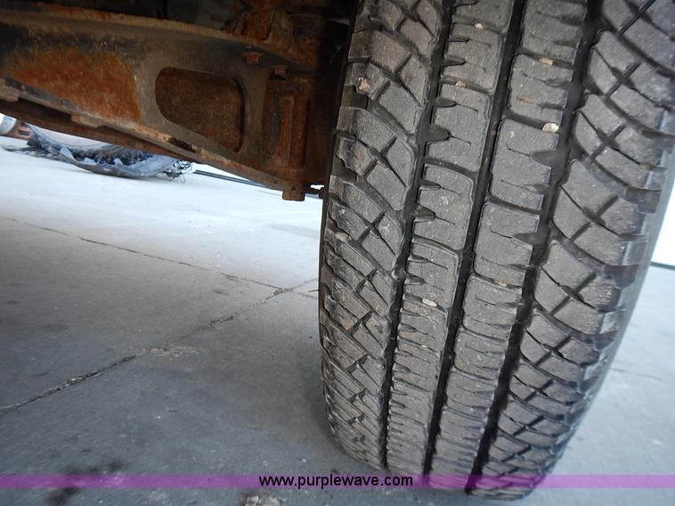 image for item L3511 1997 Ford F350 XL flatbed pickup truck with crane