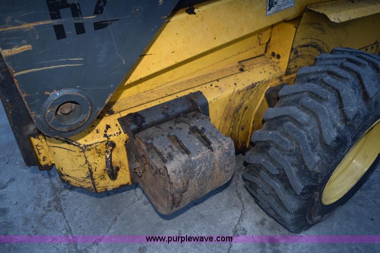 image for item K3374 2004 New Holland LS180 skid steer