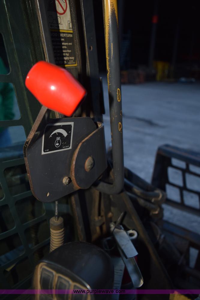 image for item K3374 2004 New Holland LS180 skid steer