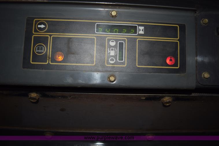 image for item K3374 2004 New Holland LS180 skid steer