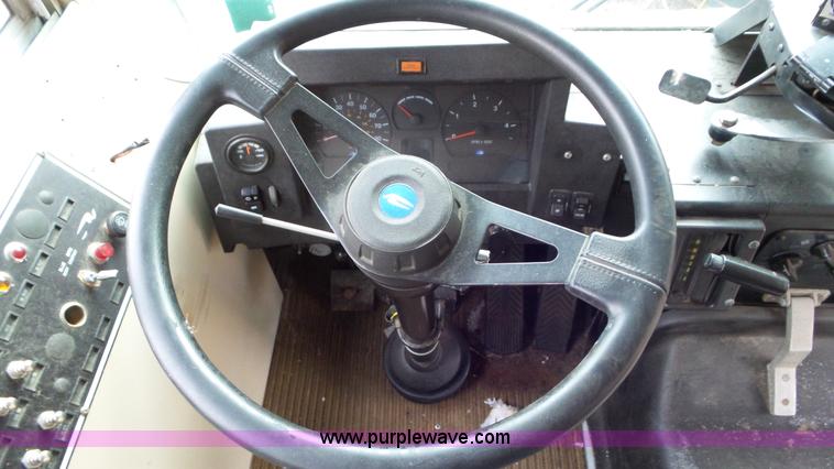 image for item L3879 1999 Blue Bird TC2000 school bus