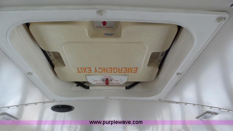 image for item L3879 1999 Blue Bird TC2000 school bus