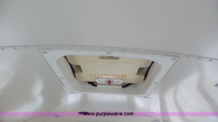 image for item L3879 1999 Blue Bird TC2000 school bus