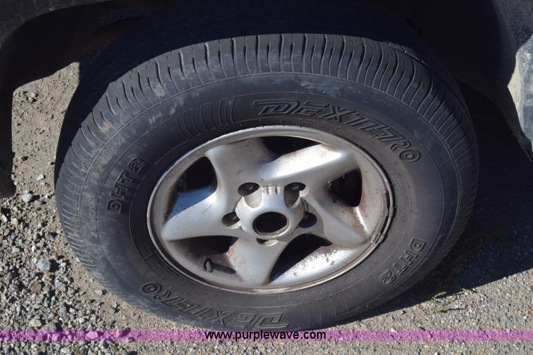 image for item K4838 2001 Dodge Ram 1500 Quad Cab pickup truck