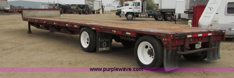 image for item J1690 1993 Trail King drop deck trailer
