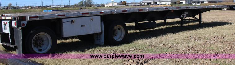 image for item J4264 1999 Fontaine flatbed trailer