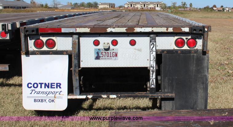 image for item J4264 1999 Fontaine flatbed trailer