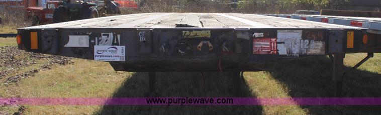 image for item J4264 1999 Fontaine flatbed trailer
