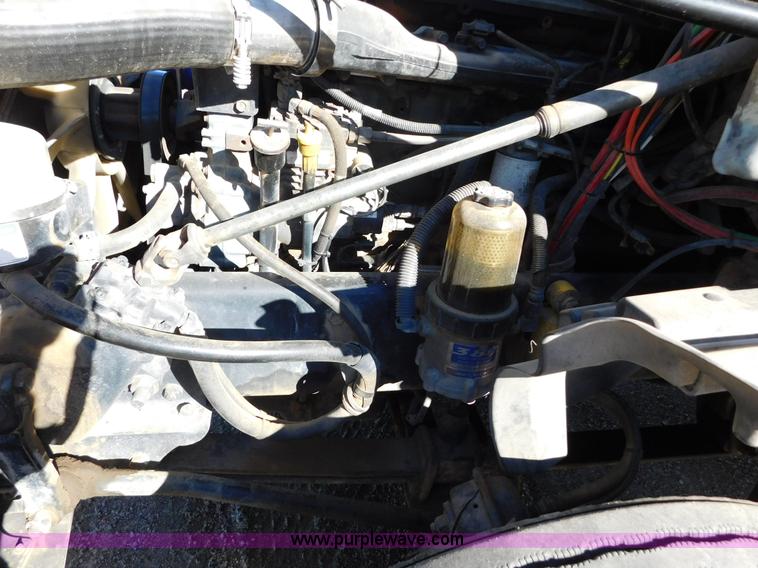 image for item J6842 2004 Freightliner Century Class ST120 semi truck