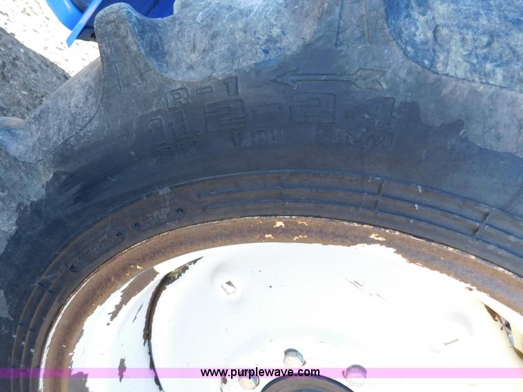 image for item AW9377 2011 New Holland TC30 MFWD tractor