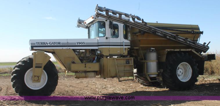 image for item J1383 1992 Ag-Chem TerraGator 1903 Air Max V dry fertilizer applicator