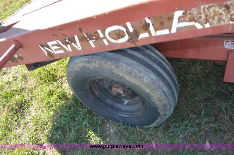image for item K7592 New Holland 1010 Stackliner bale wagon