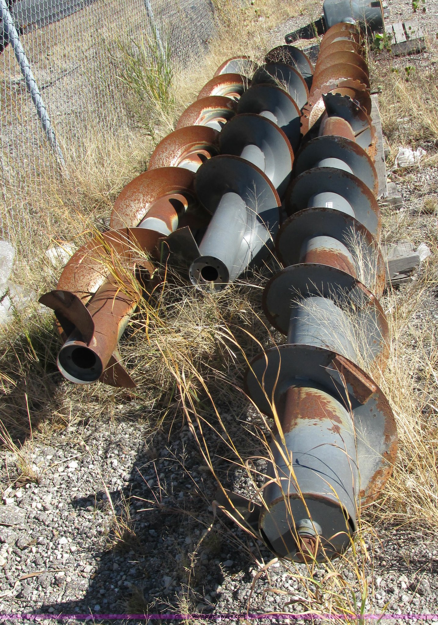 (2) combine header augers in Hesston, KS Item BK9070 sold Purple Wave