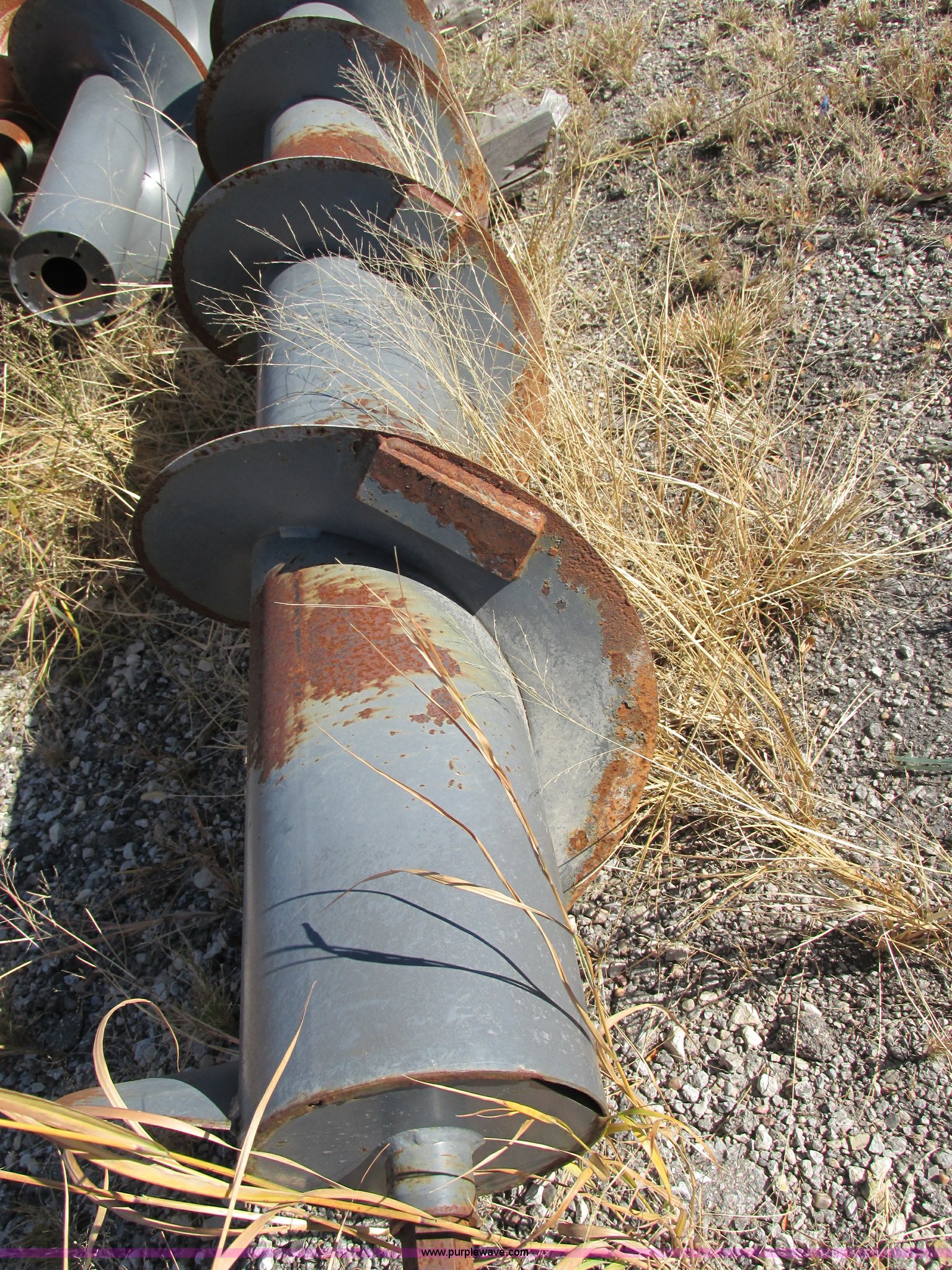 (2) combine header augers in Hesston, KS Item BK9070 sold Purple Wave