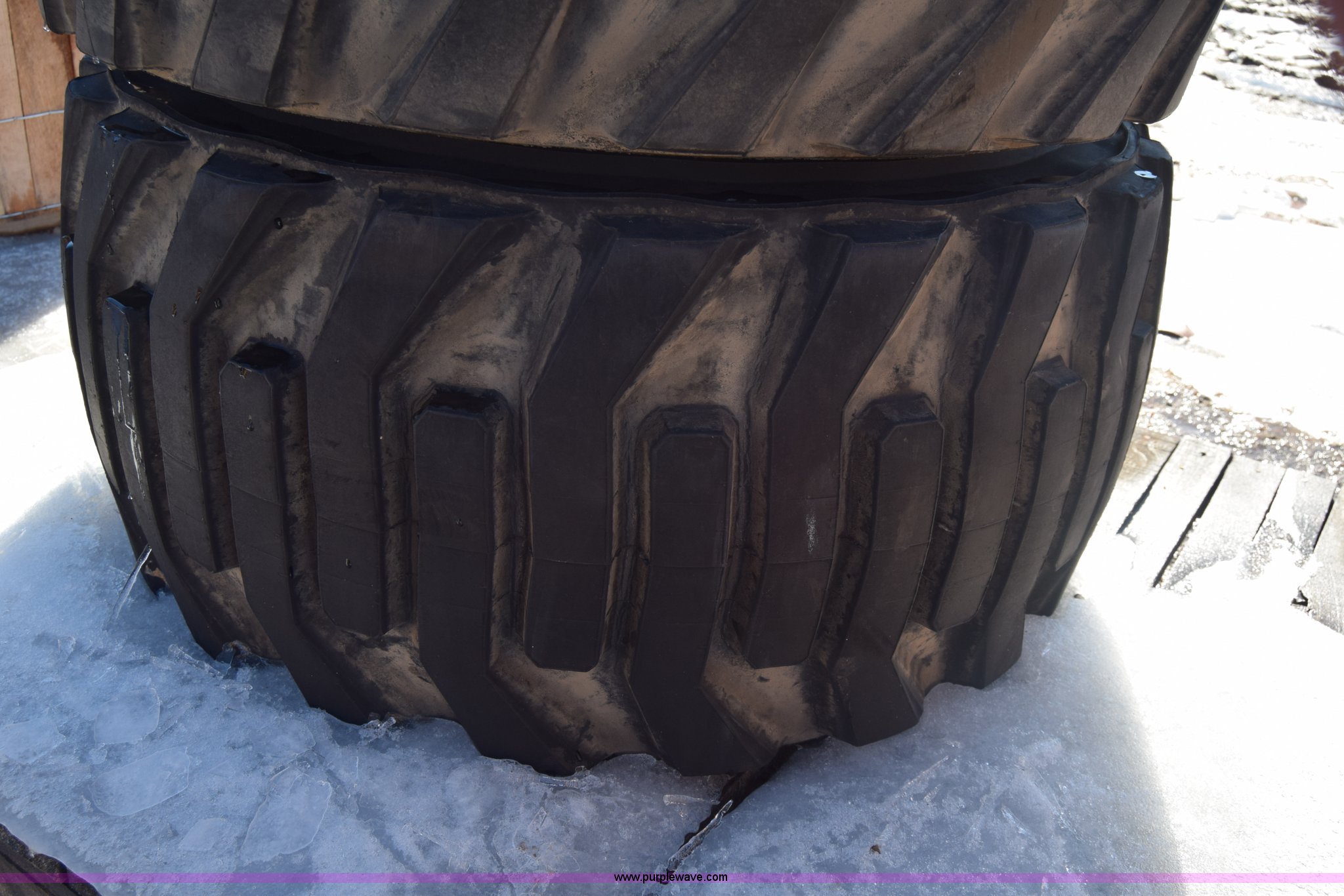 (2) Titan 33x15.5016.5 skid steer tires and wheels in Kinsley, KS