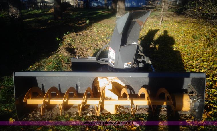 image for item AL9248 2007 New Holland snow blower skid steer attachment