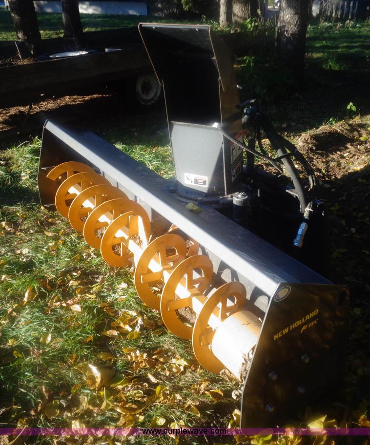 image for item AL9248 2007 New Holland snow blower skid steer attachment