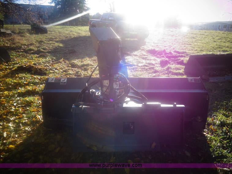 image for item AL9248 2007 New Holland snow blower skid steer attachment