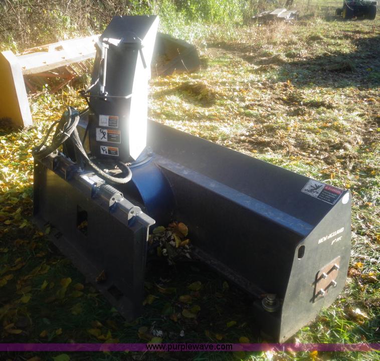 image for item AL9248 2007 New Holland snow blower skid steer attachment