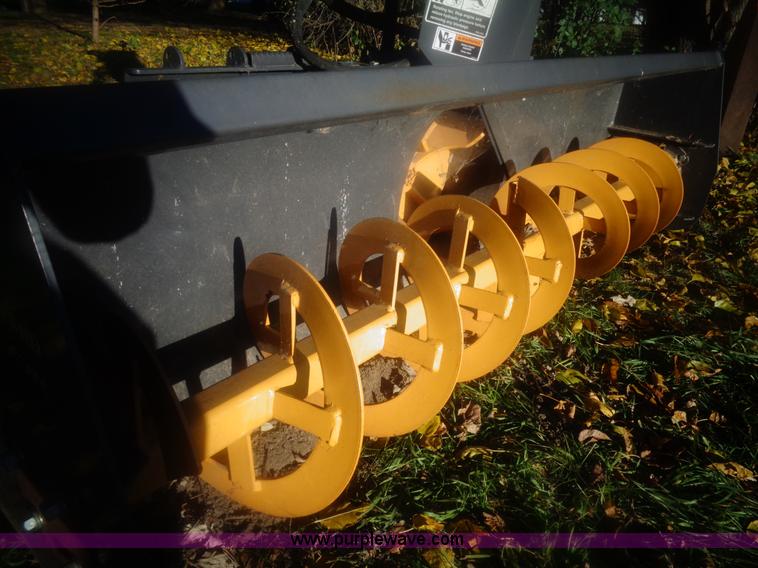 image for item AL9248 2007 New Holland snow blower skid steer attachment