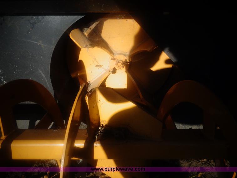 image for item AL9248 2007 New Holland snow blower skid steer attachment