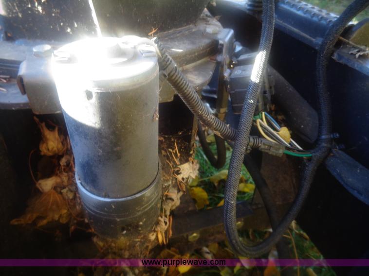 image for item AL9248 2007 New Holland snow blower skid steer attachment