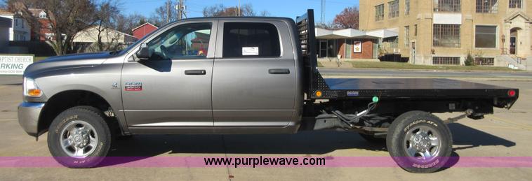 image for item I1845 2011 Dodge Ram 3500 Crew Cab flatbed pickup truck
