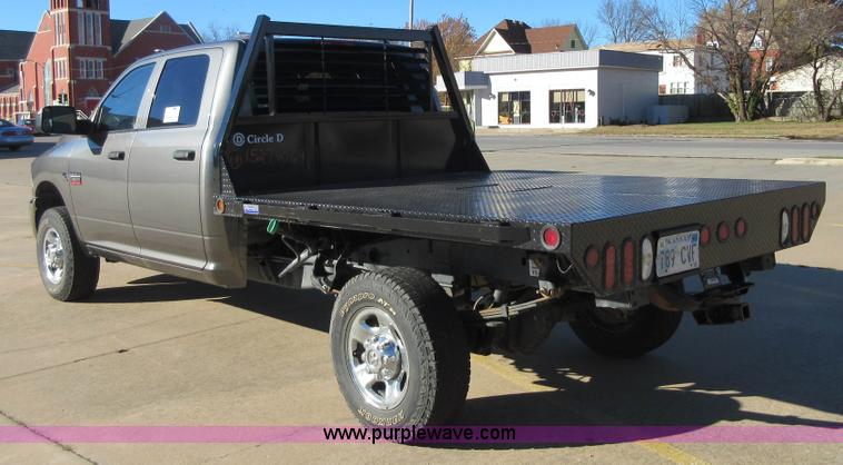 image for item I1845 2011 Dodge Ram 3500 Crew Cab flatbed pickup truck