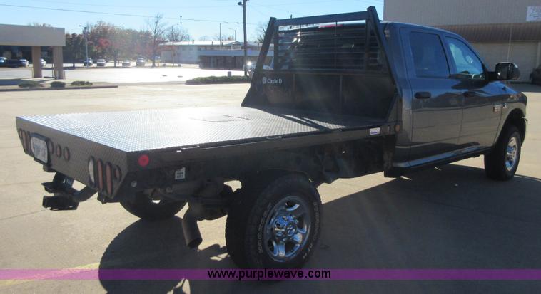image for item I1845 2011 Dodge Ram 3500 Crew Cab flatbed pickup truck
