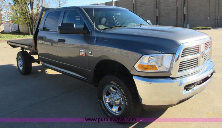 image for item I1845 2011 Dodge Ram 3500 Crew Cab flatbed pickup truck