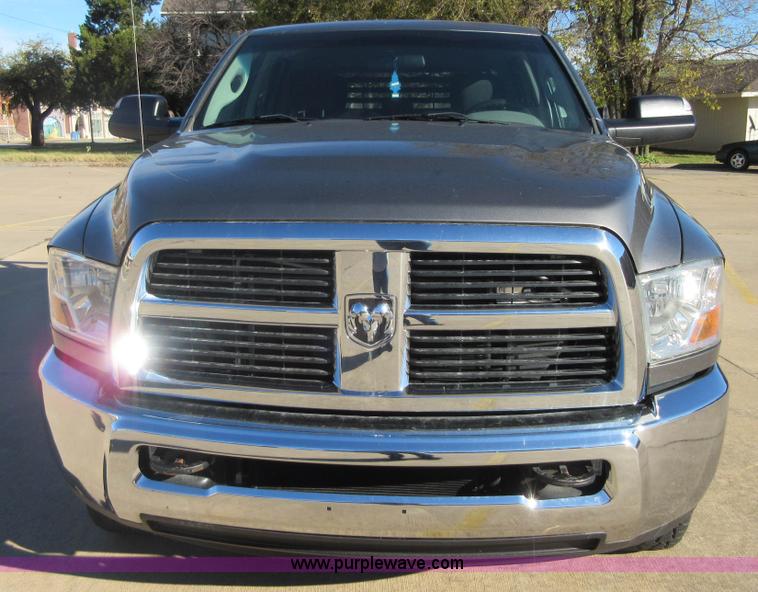 image for item I1845 2011 Dodge Ram 3500 Crew Cab flatbed pickup truck