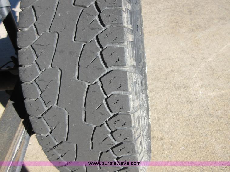 image for item I1845 2011 Dodge Ram 3500 Crew Cab flatbed pickup truck