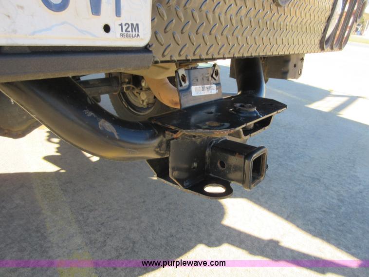 image for item I1845 2011 Dodge Ram 3500 Crew Cab flatbed pickup truck