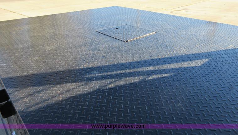 image for item I1845 2011 Dodge Ram 3500 Crew Cab flatbed pickup truck