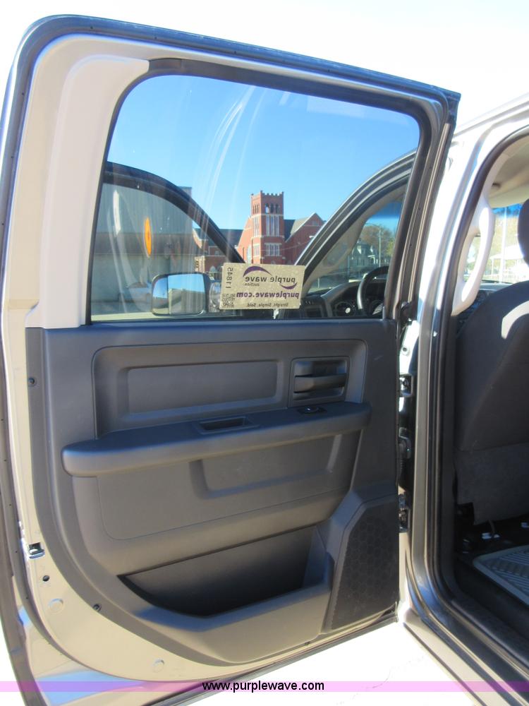 image for item I1845 2011 Dodge Ram 3500 Crew Cab flatbed pickup truck