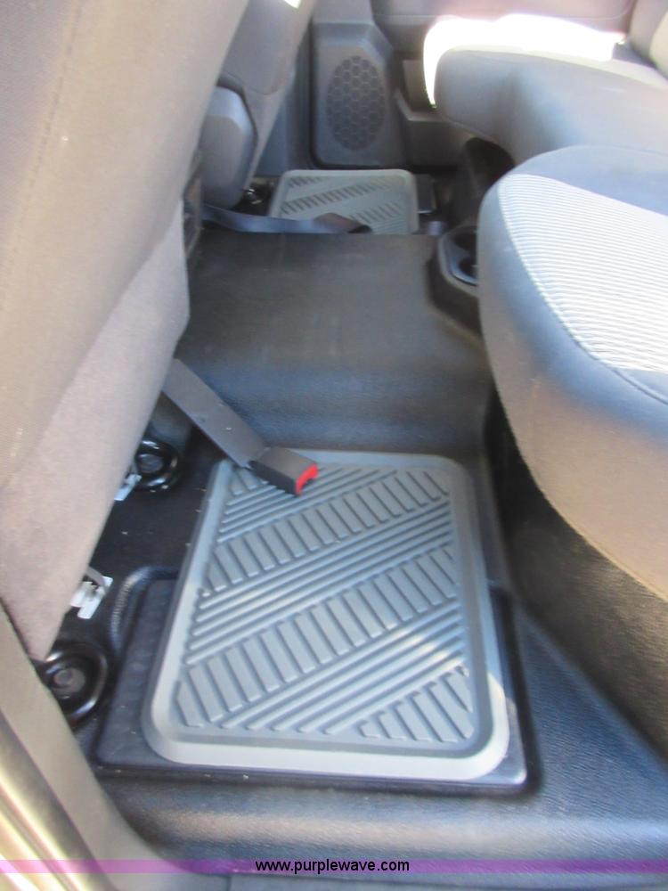 image for item I1845 2011 Dodge Ram 3500 Crew Cab flatbed pickup truck