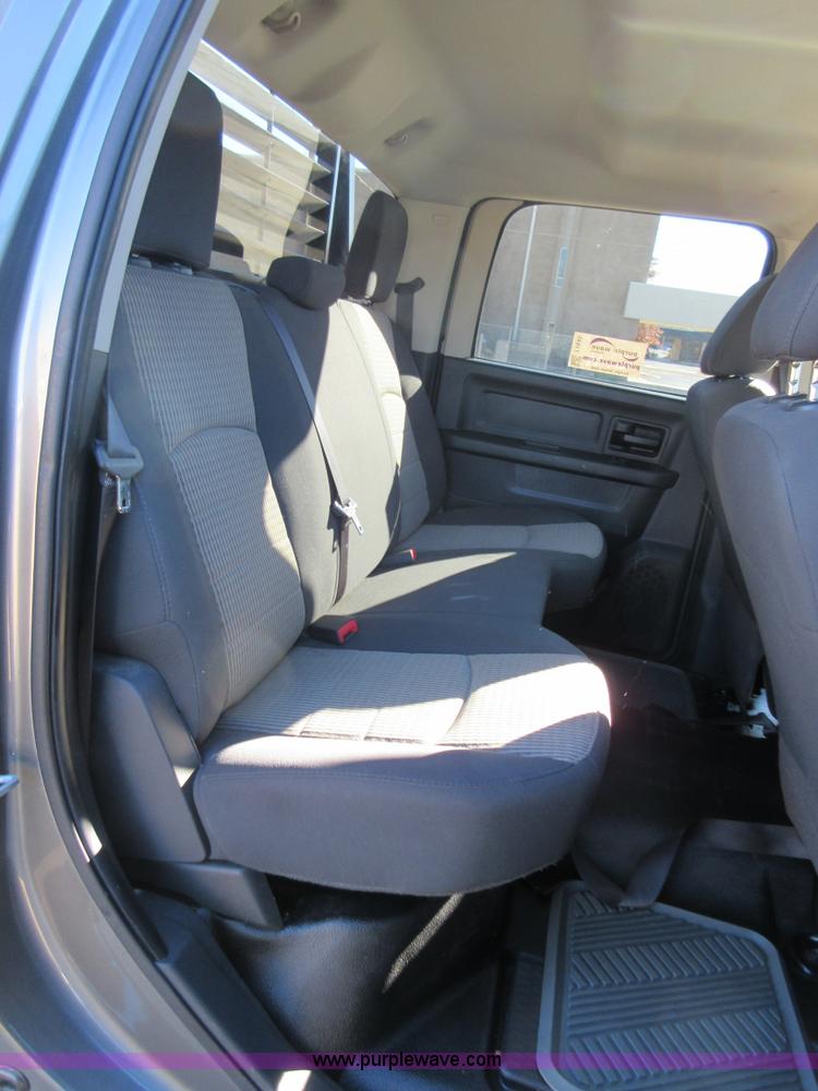 image for item I1845 2011 Dodge Ram 3500 Crew Cab flatbed pickup truck