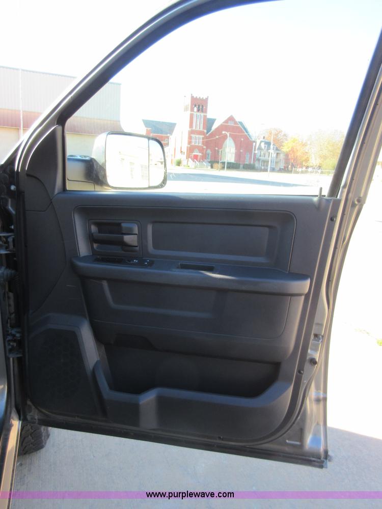 image for item I1845 2011 Dodge Ram 3500 Crew Cab flatbed pickup truck