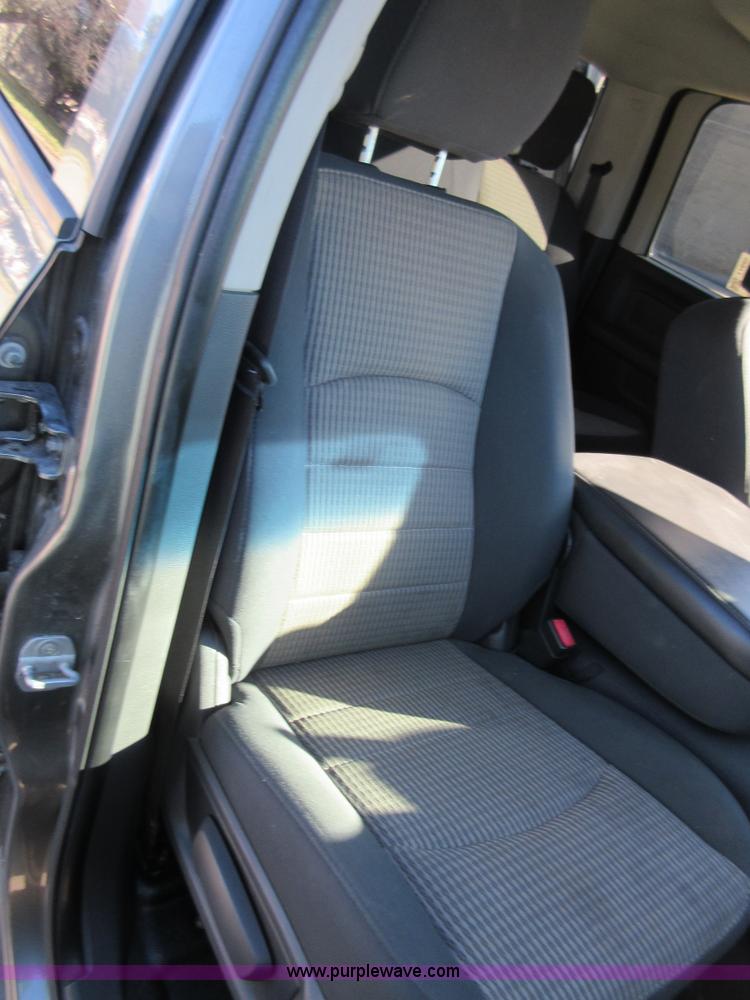 image for item I1845 2011 Dodge Ram 3500 Crew Cab flatbed pickup truck