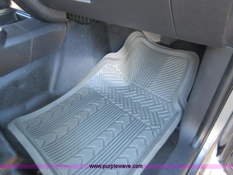 image for item I1845 2011 Dodge Ram 3500 Crew Cab flatbed pickup truck