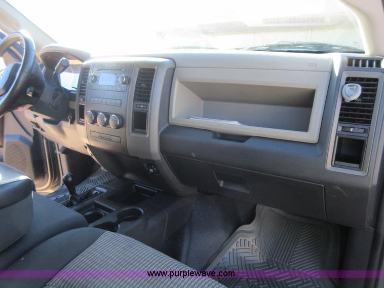 image for item I1845 2011 Dodge Ram 3500 Crew Cab flatbed pickup truck