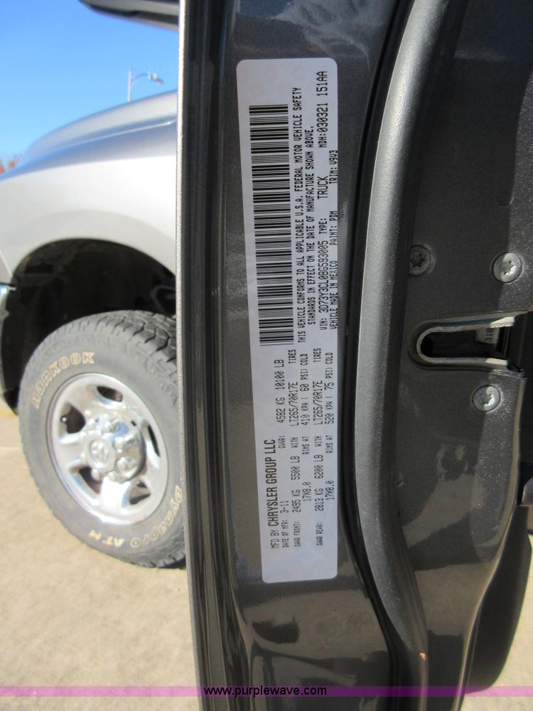 image for item I1845 2011 Dodge Ram 3500 Crew Cab flatbed pickup truck