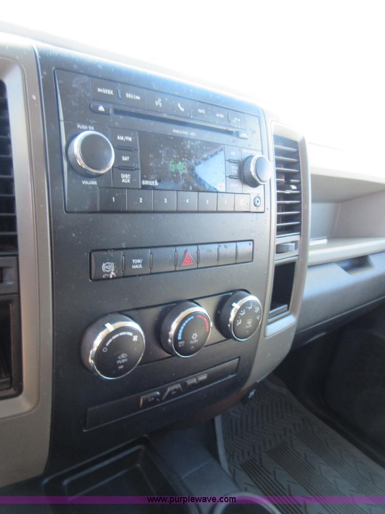 image for item I1845 2011 Dodge Ram 3500 Crew Cab flatbed pickup truck