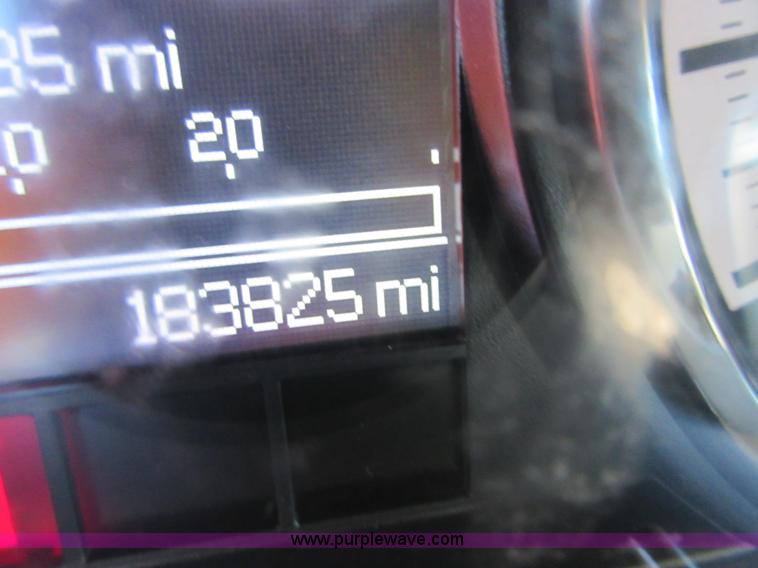 image for item I1845 2011 Dodge Ram 3500 Crew Cab flatbed pickup truck