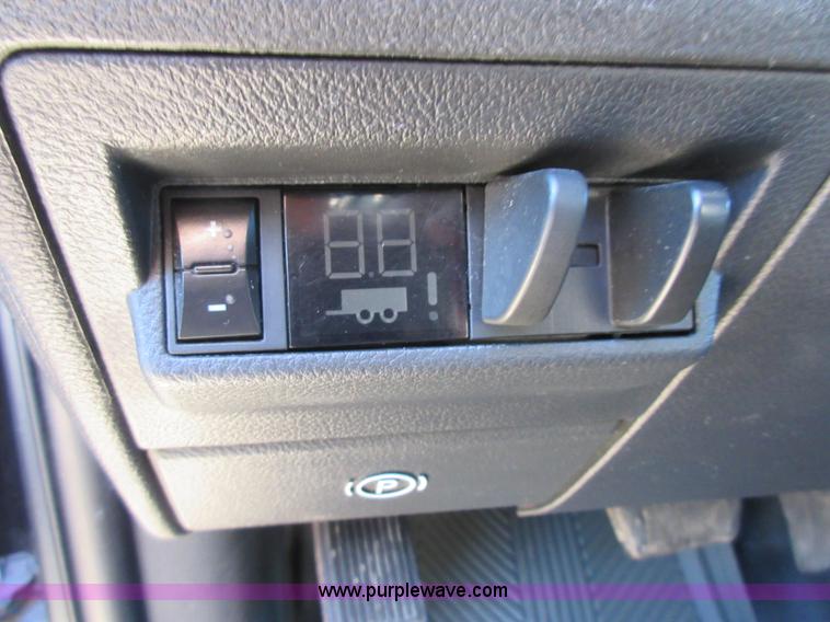 image for item I1845 2011 Dodge Ram 3500 Crew Cab flatbed pickup truck