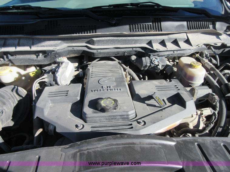 image for item I1845 2011 Dodge Ram 3500 Crew Cab flatbed pickup truck