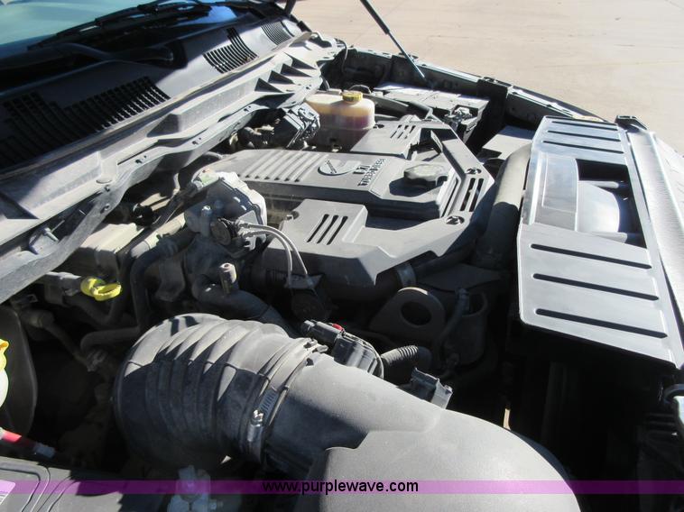 image for item I1845 2011 Dodge Ram 3500 Crew Cab flatbed pickup truck