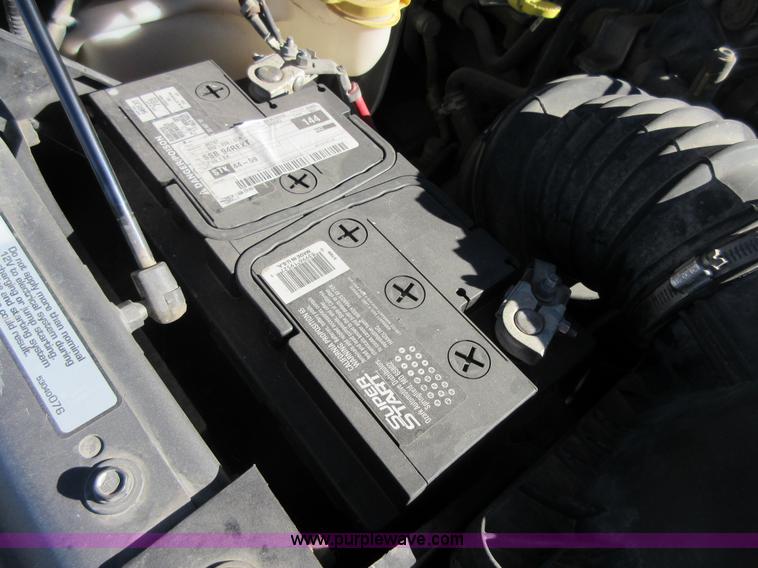 image for item I1845 2011 Dodge Ram 3500 Crew Cab flatbed pickup truck