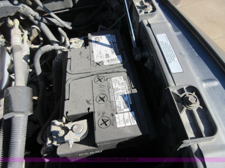 image for item I1845 2011 Dodge Ram 3500 Crew Cab flatbed pickup truck