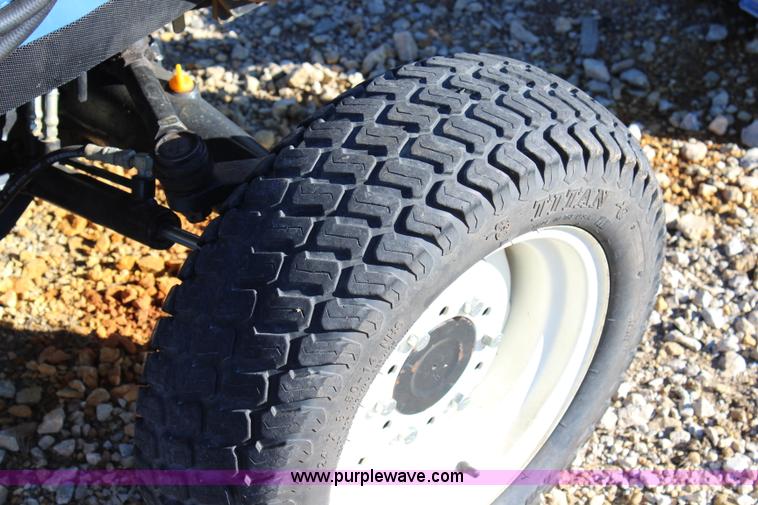 image for item J4514 2005 New Holland TC33DA MFWD tractor